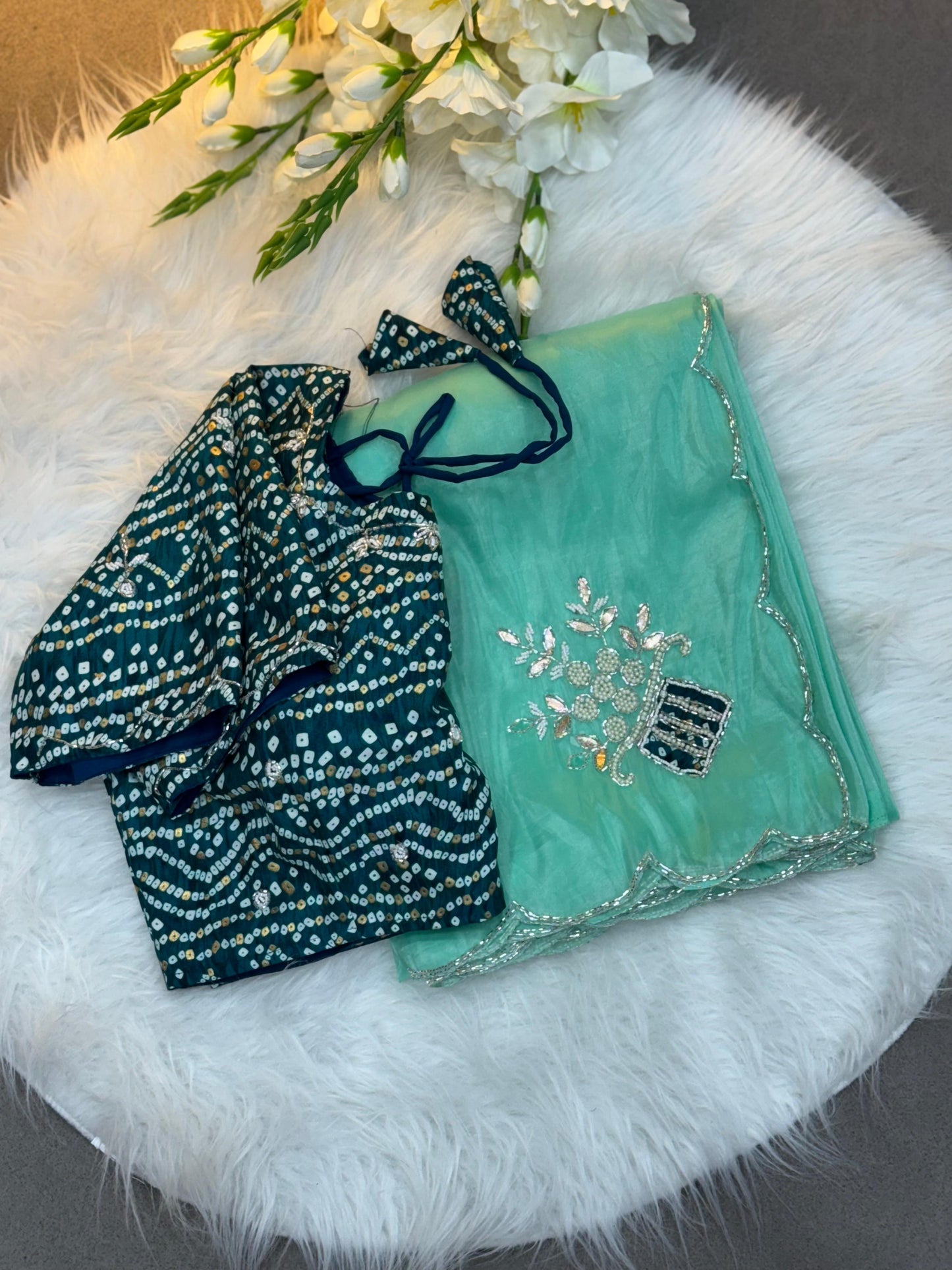 Suhani Sky Blue Chiffon Saree with Red Bandhej Blouse