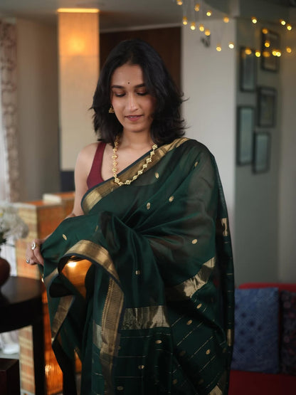 Demure Dark Green Cotton Silk Saree With Flaunt Blouse Piece