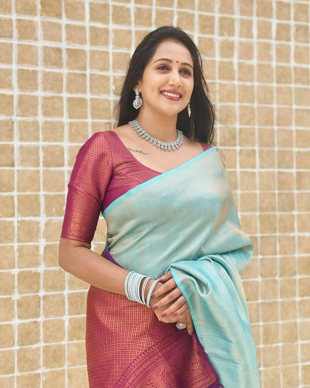 Dazzling Firozi Soft Silk Saree