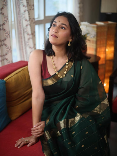 Demure Dark Green Cotton Silk Saree With Flaunt Blouse Piece