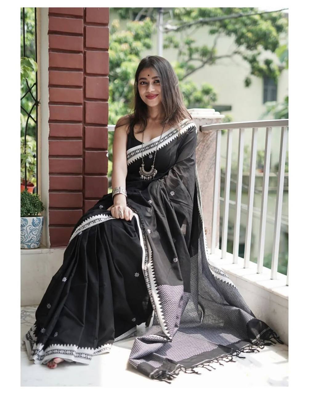 Twirling Black Cotton Silk Saree
