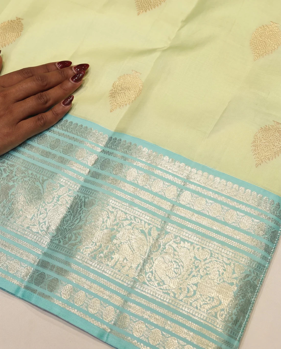 Menka - Pastel Kanjivaram Silk Saree with Zari Border