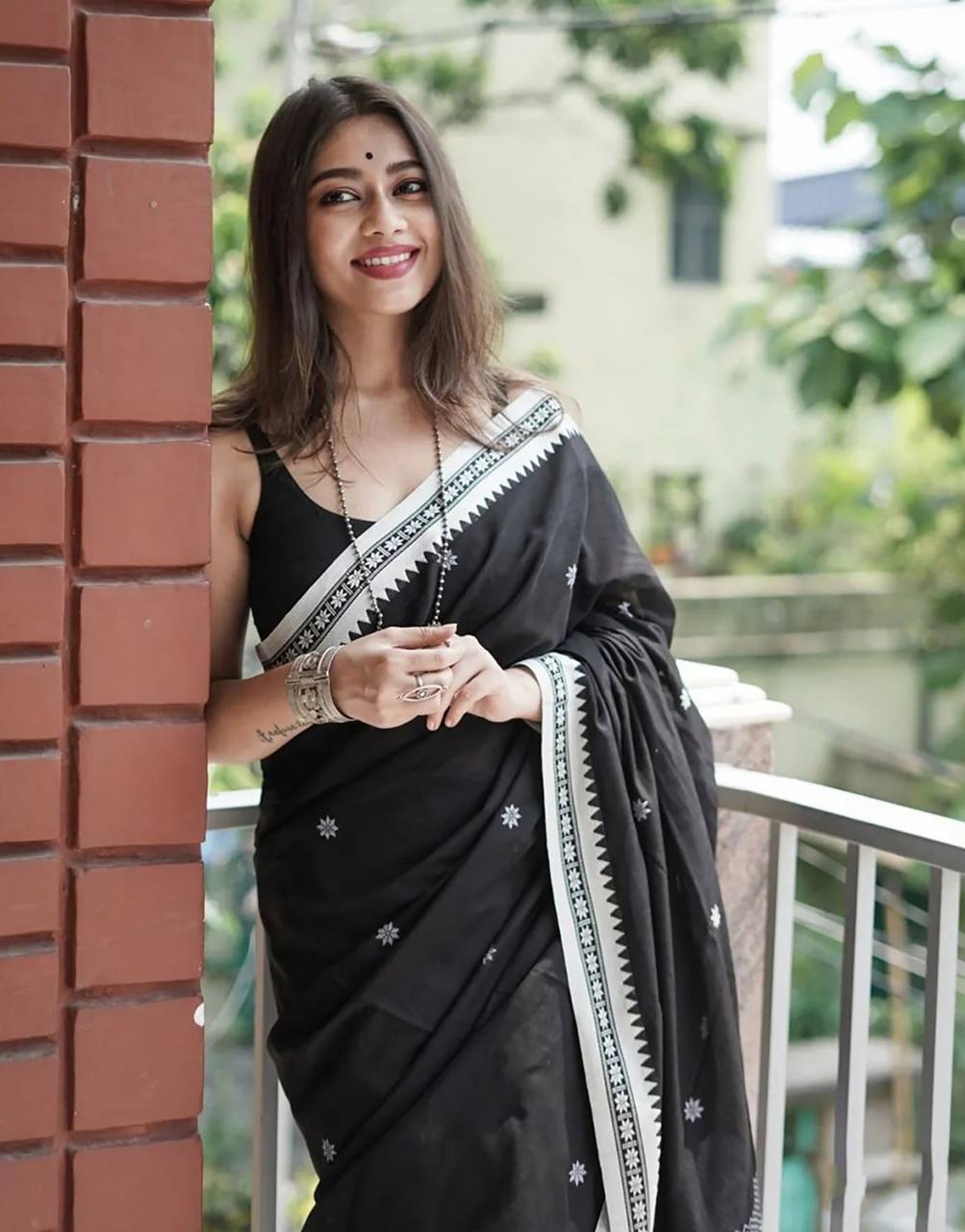 Twirling Black Cotton Silk Saree
