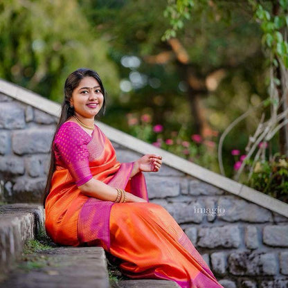 Extraordinary Orange Soft Silk Saree