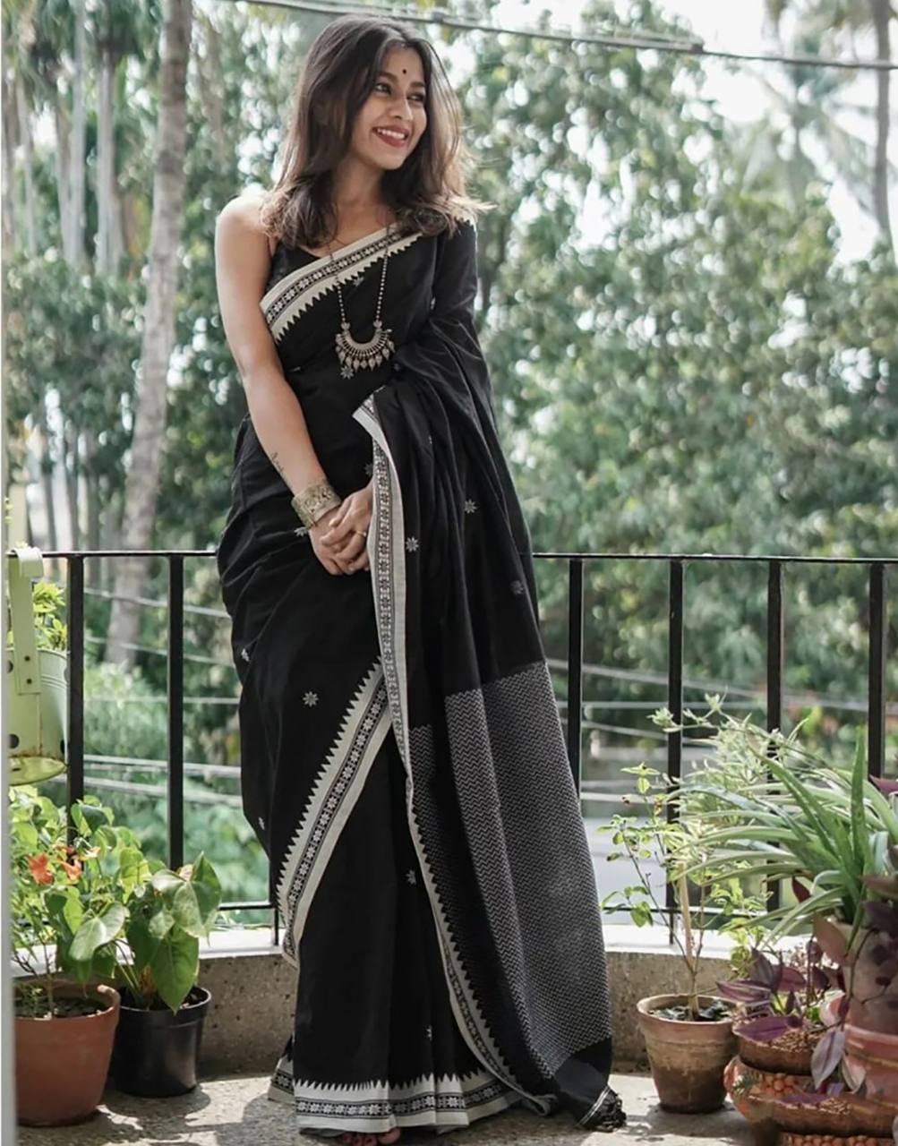 Twirling Black Cotton Silk Saree