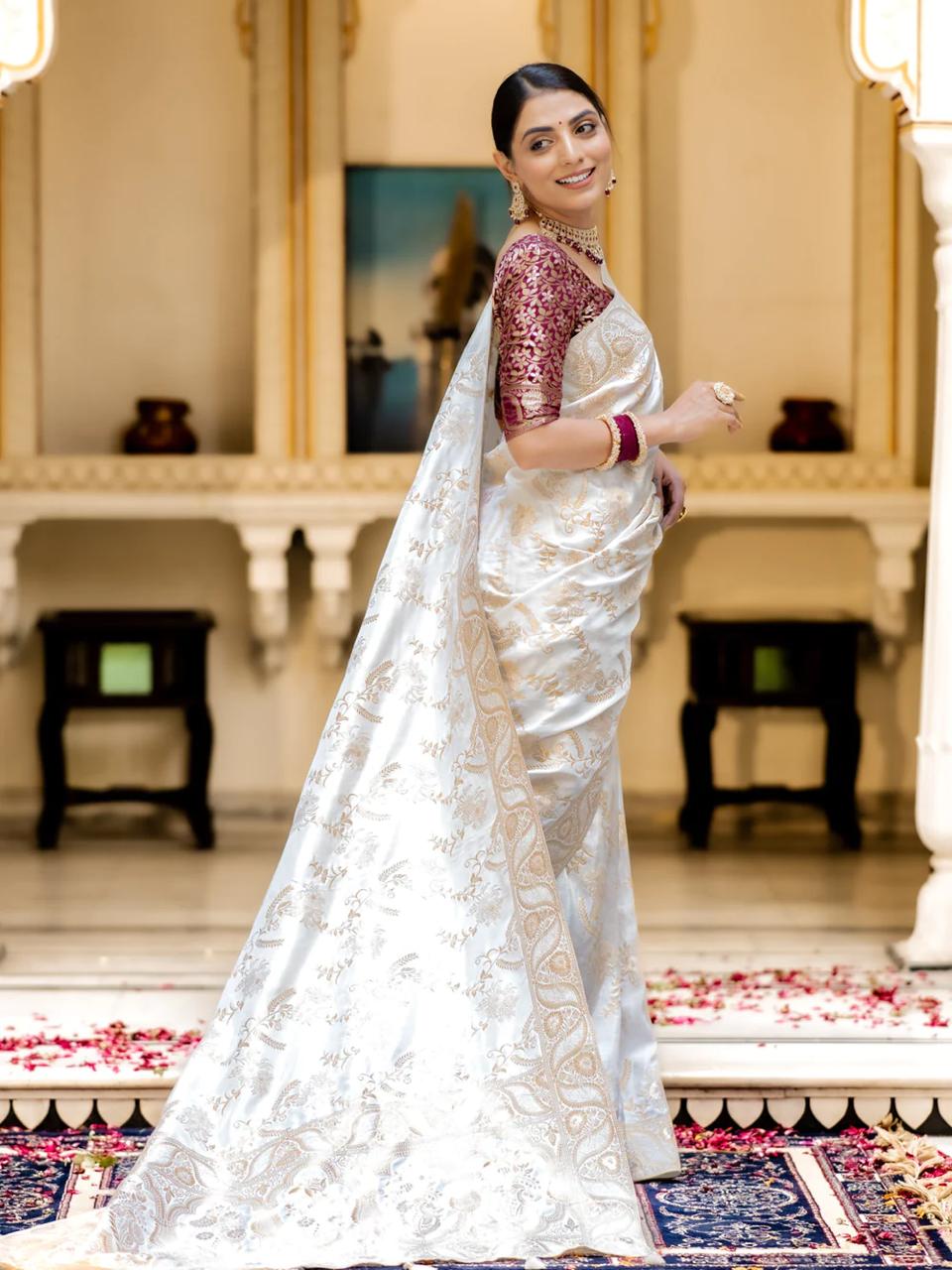 Hema White Banarasi Silk Saree WIth Fabulouse Blouse Piece