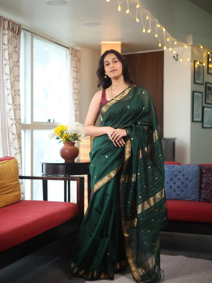 Demure Dark Green Cotton Silk Saree With Flaunt Blouse Piece