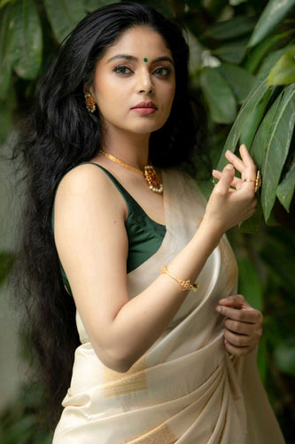 Pretty Beige Soft Silk Saree With Surpassing Blouse Piece