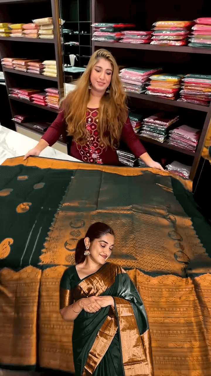Desuetude Dark Green Soft Banarasi Silk Saree With Gorgeous Blouse Piece