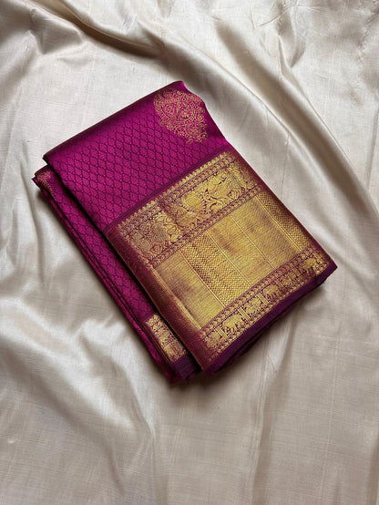 Cynosure Purple Soft Banarasi Silk Saree With Sempiternal Blouse Piece