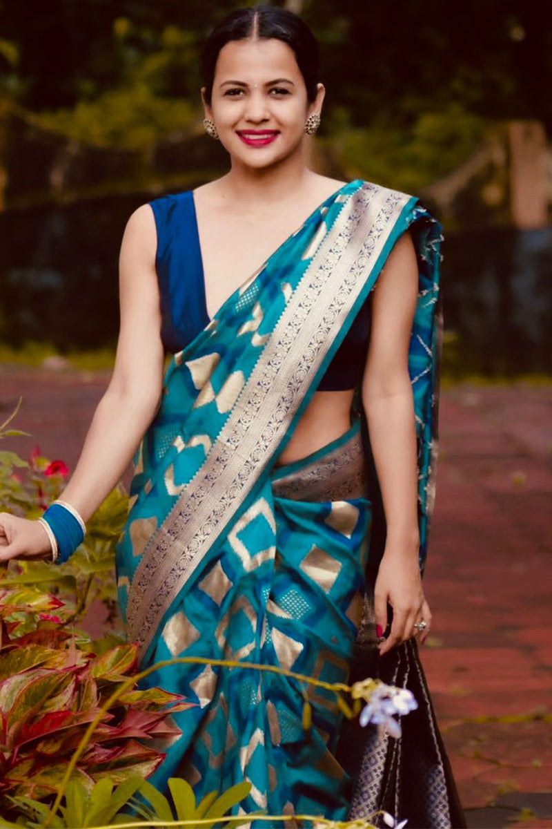 Majestic Firozi Soft Silk Saree With Aplomb Blouse Piece