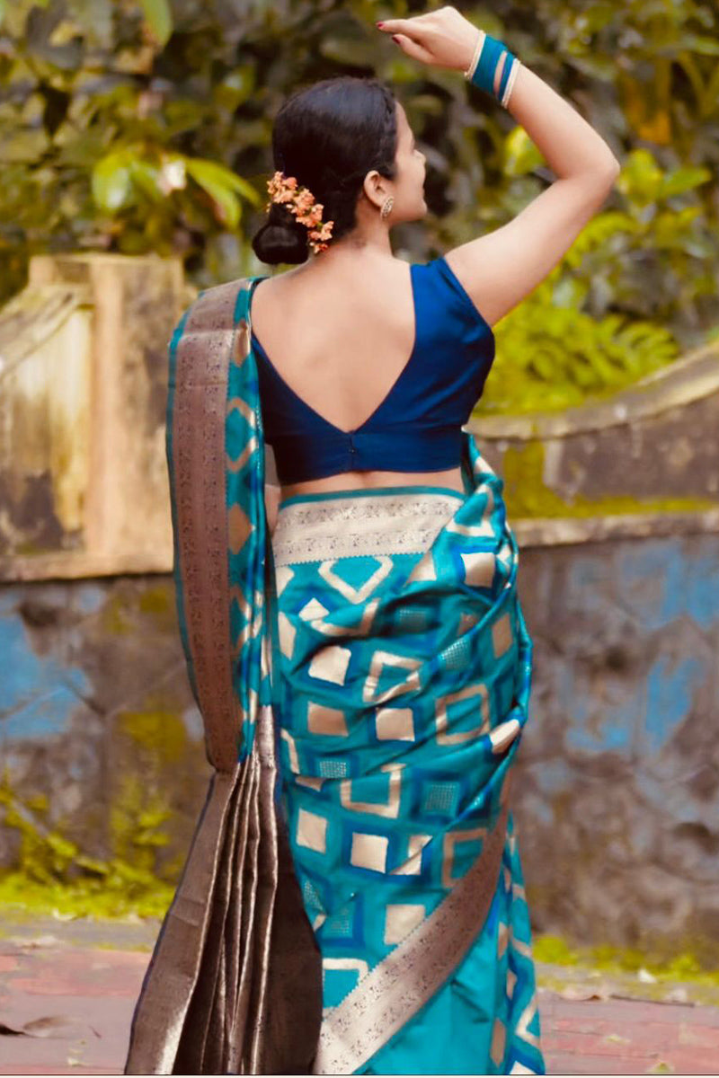 Majestic Firozi Soft Silk Saree With Aplomb Blouse Piece