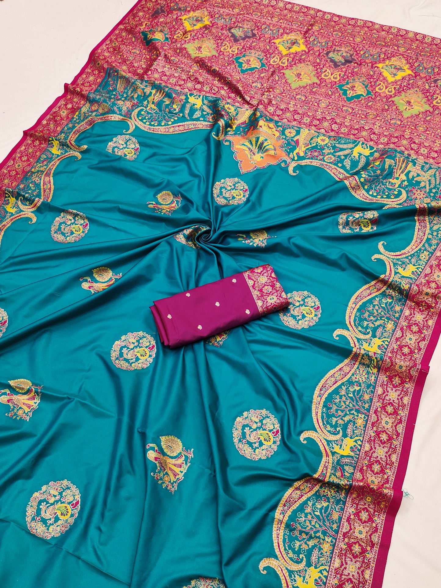 Teal Green Printed Silk Saree with Rani Pink Ornate Border & Designer Pallu