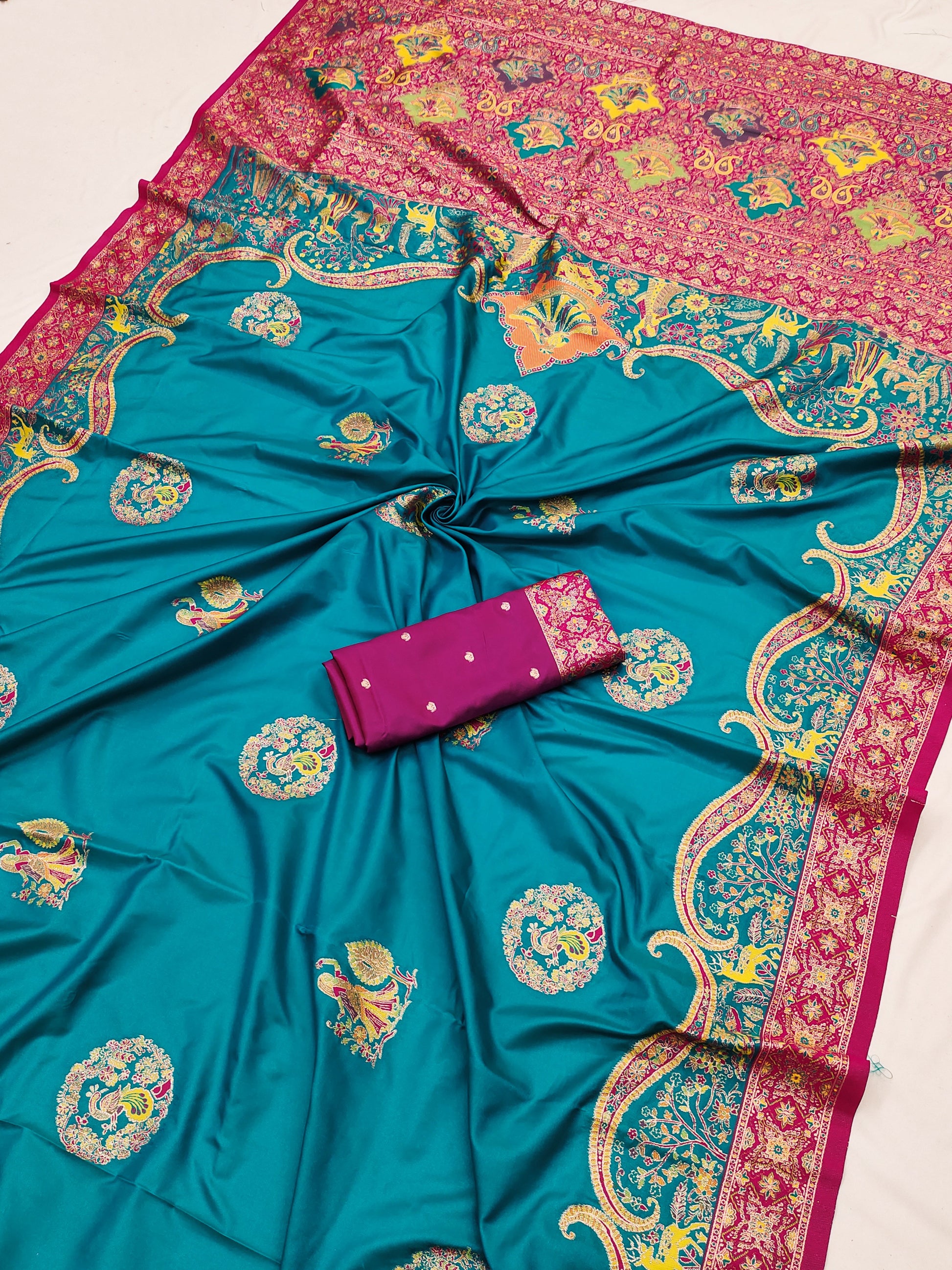 Teal Green Printed Silk Saree with Rani Pink Ornate Border & Designer Pallu