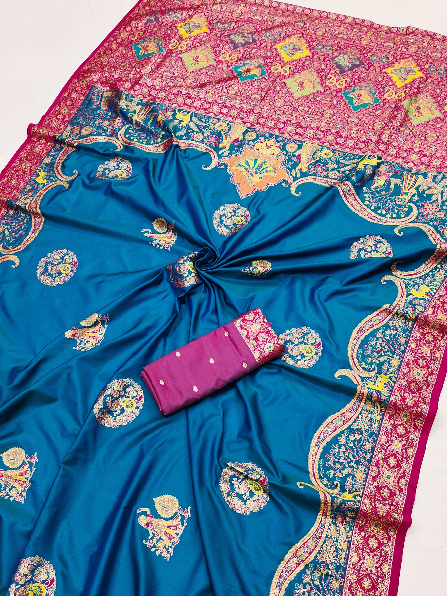 Teal Blue Printed Silk Saree with Pink Ornate Border and Designer Pallu
