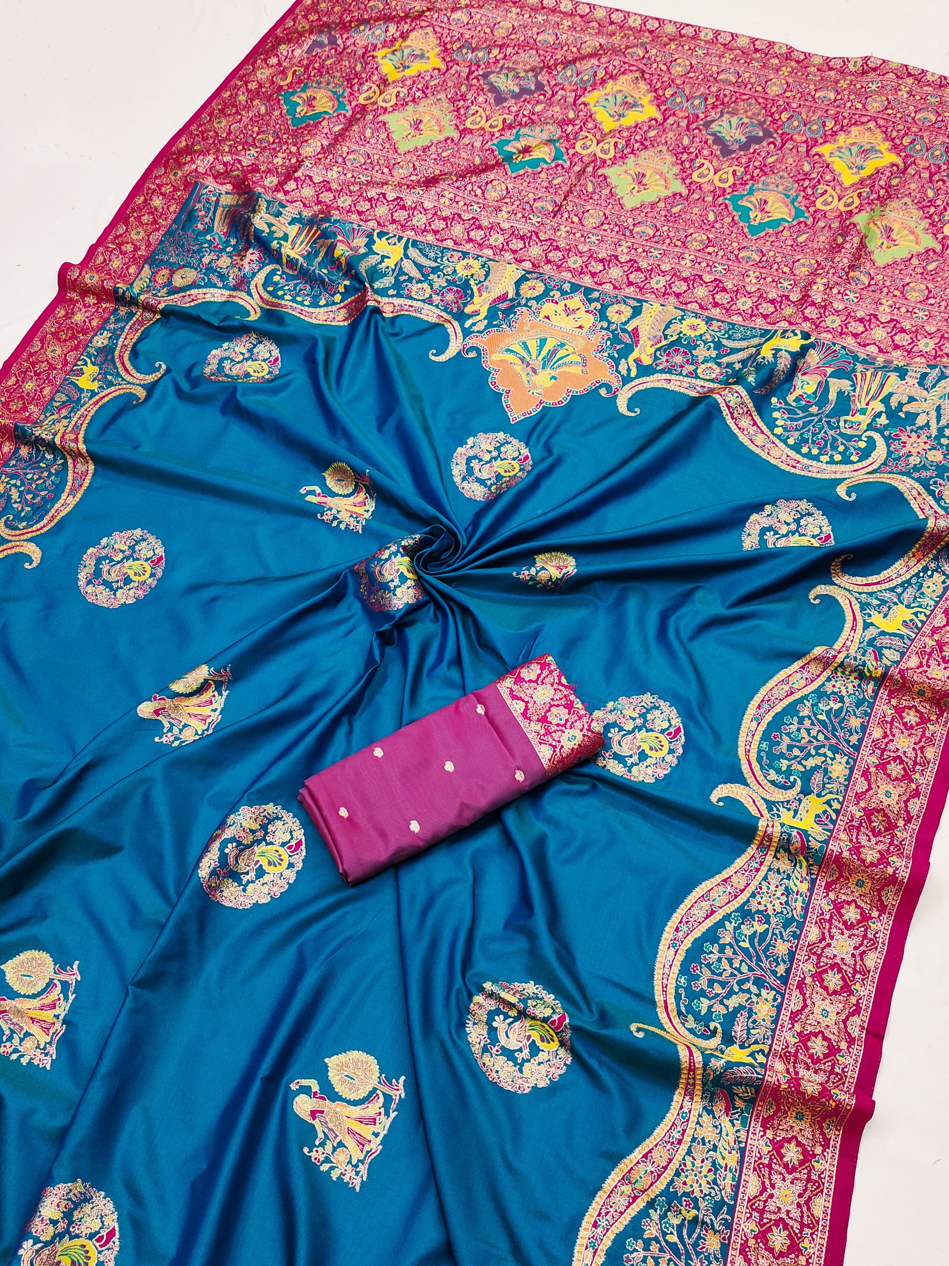 Teal Blue Printed Silk Saree with Pink Ornate Border and Designer Pallu
