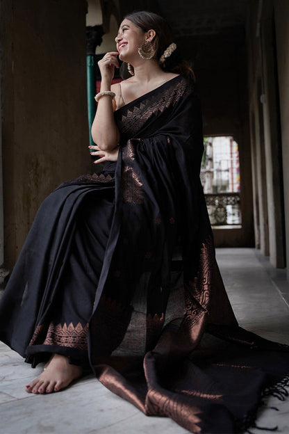 Entrancing Black Soft Silk Saree With Brood Blouse Piece