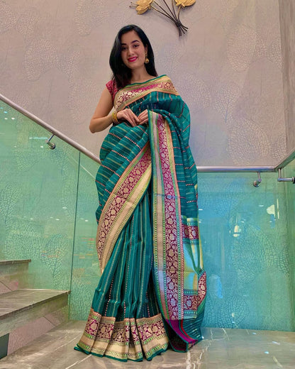 Attractive Rama Soft Silk Saree With Classy Blouse Piece