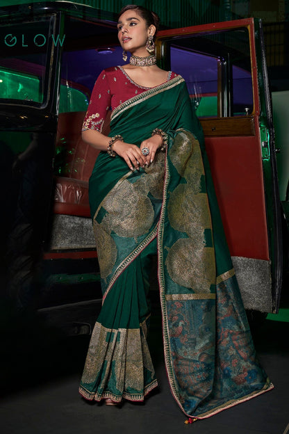 Engrossing Dark Green Banarasi Satin Silk Saree With Gossamer Blouse