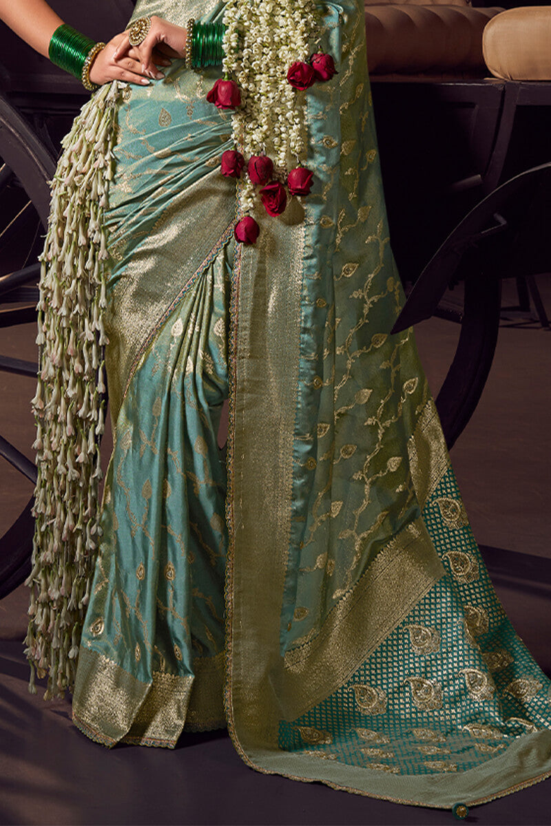 Blissful Sea Green Pure Viscose Tissue Banrasi Silk Saree With Glowing Blouse Piece