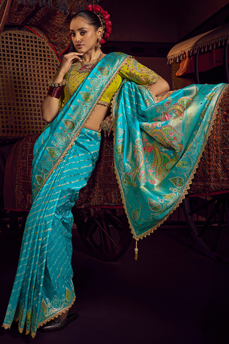 Precious Firozi Pure Viscose Dola Silk Saree With Blooming Blouse Piece