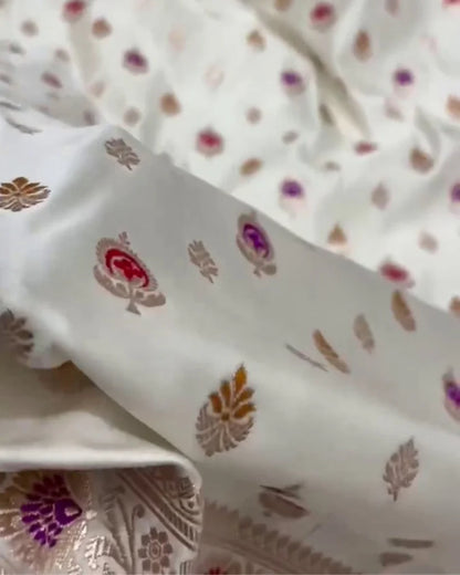 Mrinalini – White Satin Mashru Banarasi Saree with Meena Buta and Floral Zari Pallu