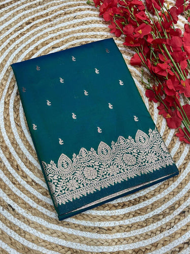 Effulgent Rama Soft Banarasi Silk Saree With Denouement Blouse Piece