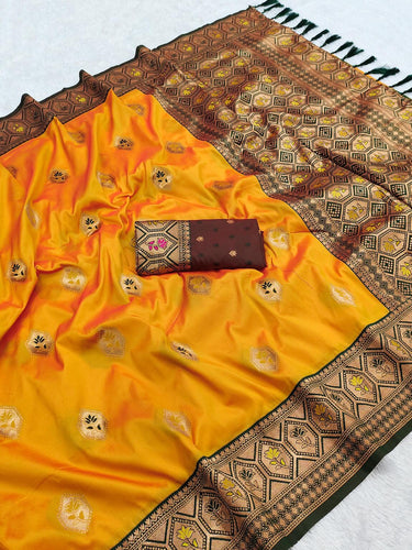 Cynosure Yellow Soft Banarasi Silk Saree With Rhapsody Blouse Piece