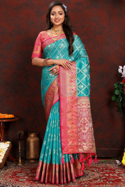 Lovely Firozi Soft Banarasi Silk Saree With Adorning Blouse Piece