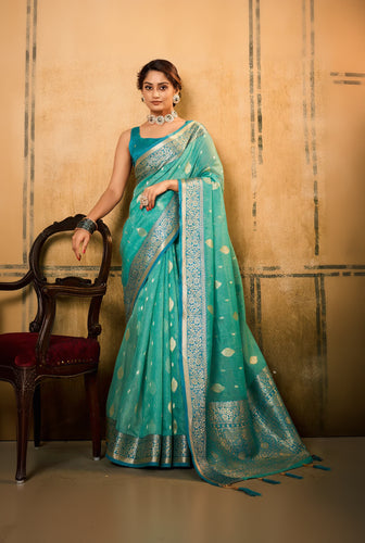Outstanding Sea Green Soft Banarasi Silk Saree With Appealing Blouse Piece