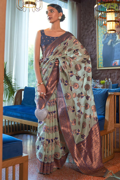 Splendiferous Peach Organza Silk Saree With Tempting Blouse Piece