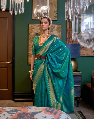 Angelic Rama Soft Banarasi Silk Saree With Bucolic Blouse Piece