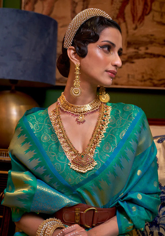 Angelic Rama Soft Banarasi Silk Saree With Bucolic Blouse Piece
