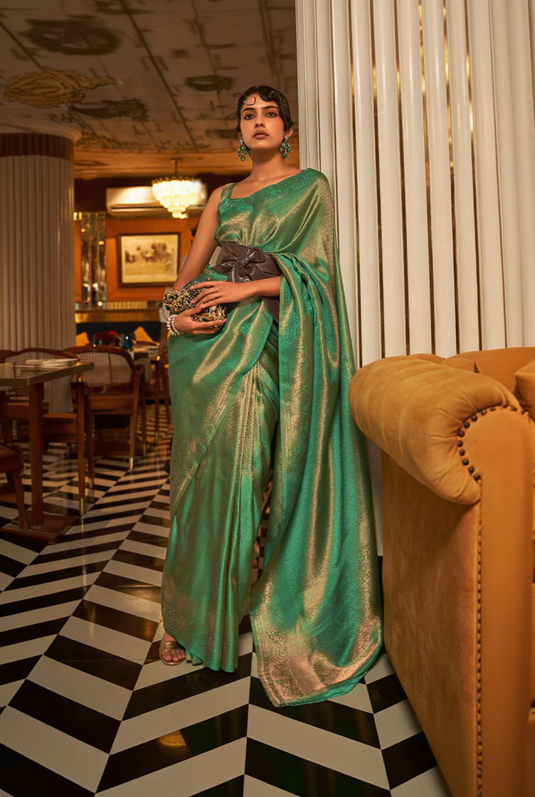 Flattering Green Kanjivaram Silk Saree With Precious Blouse Piece