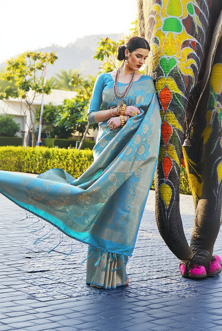 Arresting Firozi Kanjivaram Silk Saree With Flamboyant Blouse Piece