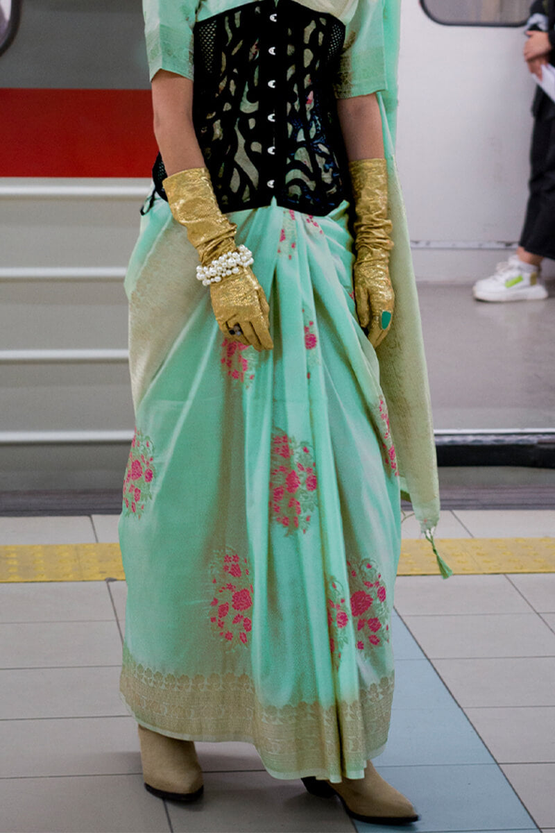 Sonorous Turquoise Soft Banarasi Silk Saree With Grandiose Blouse Piece