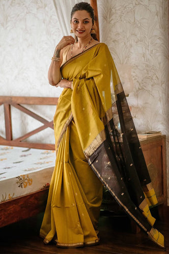 Gleaming Mustard Cotton Silk Saree With Classy Blouse Piece