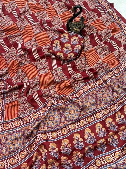Glamorous Maroon Ajrakh Printed Gajji Soft Silk Saree With Assemblage Blouse Piece