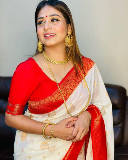 Sreemati - White Silk Saree with Golden Zari Motifs and Red Border