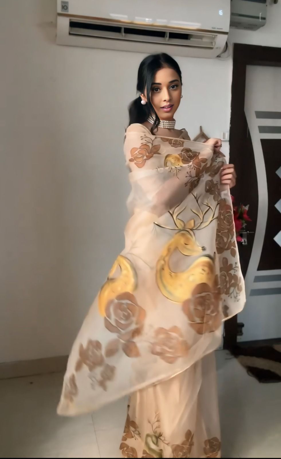 Nimara Beige Organza Saree with Hand-Painted Deer Motif