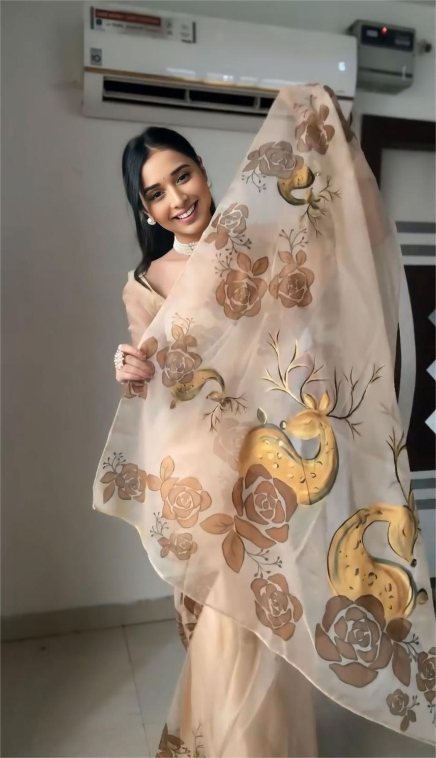 Nimara Beige Organza Saree with Hand-Painted Deer Motif