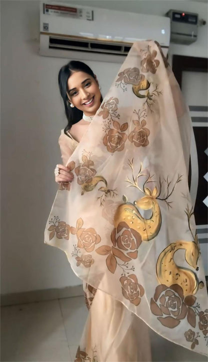 Nimara Beige Organza Saree with Hand-Painted Deer Motif