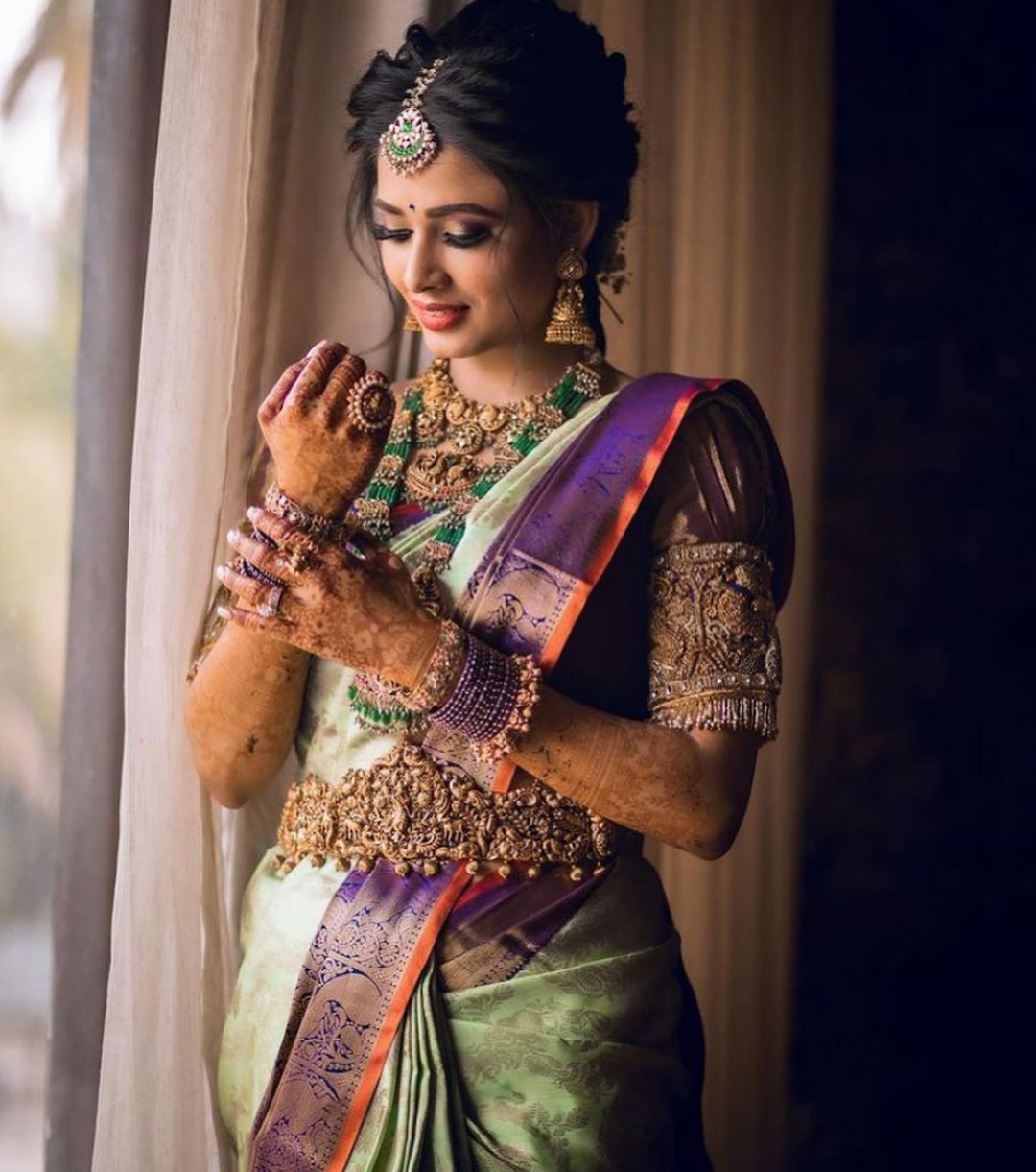 Pastel Green Kanchipuram Silk Saree with Royal Purple Zari Border