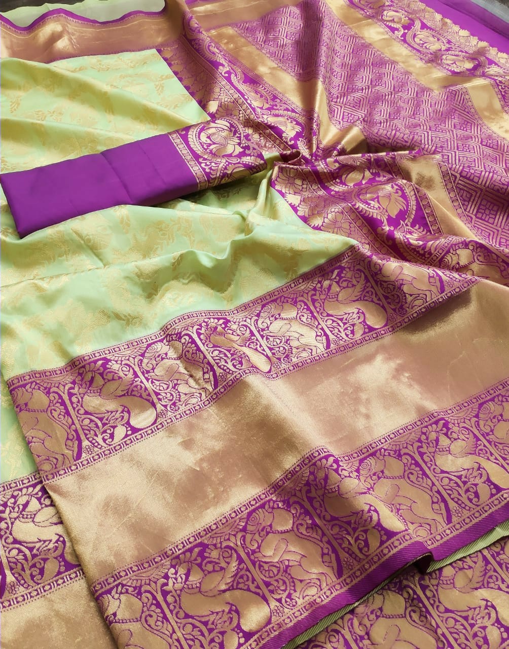 Pastel Green Kanchipuram Silk Saree with Royal Purple Zari Border