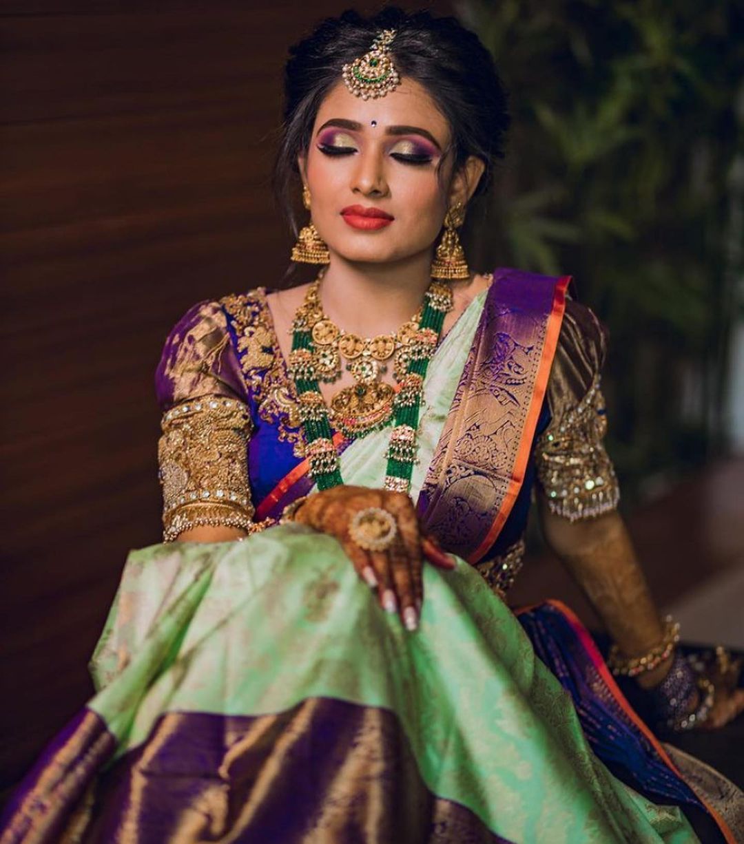 Pastel Green Kanchipuram Silk Saree with Royal Purple Zari Border