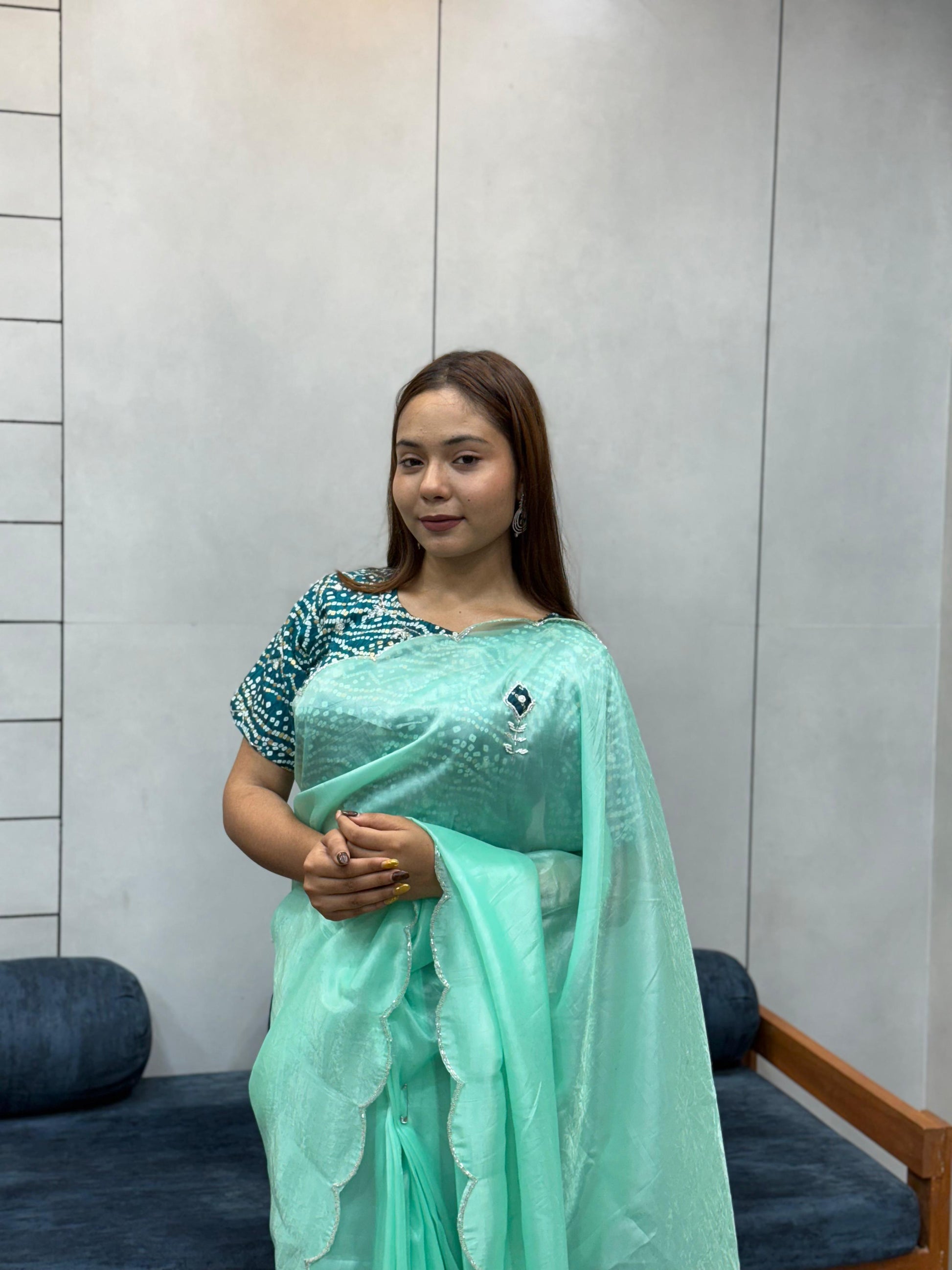 Suhani Sky Blue Chiffon Saree with Red Bandhej Blouse