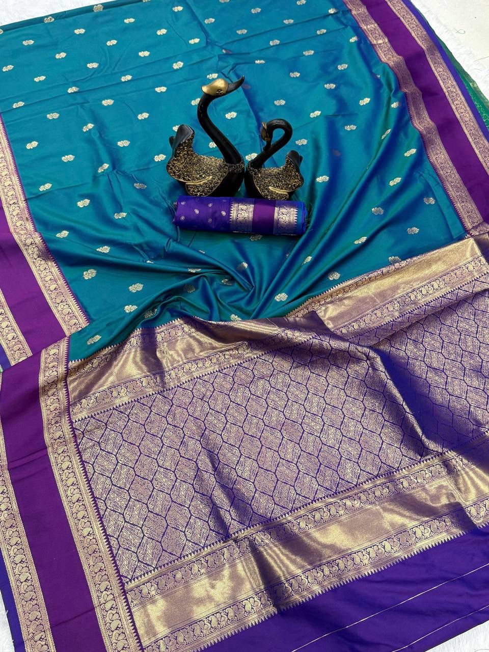Faith Teal Green Soft Silk Saree with Purple Golden Jacquard Border & Unstitched Blouse Piece