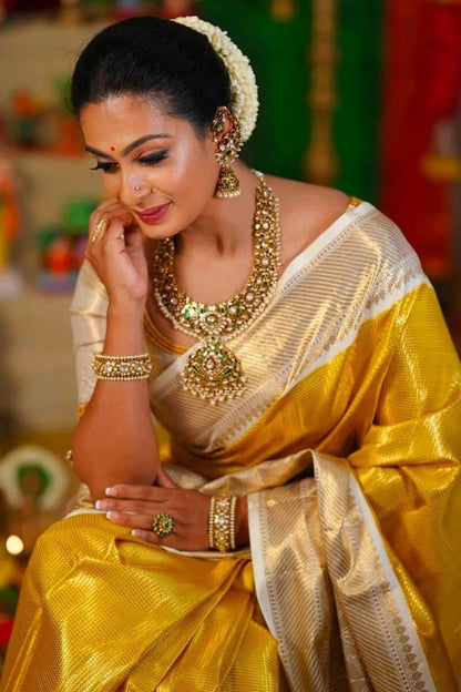 Sumitra - Yellow Kanjivaram Silk Saree with Rich Zari Weaving Border