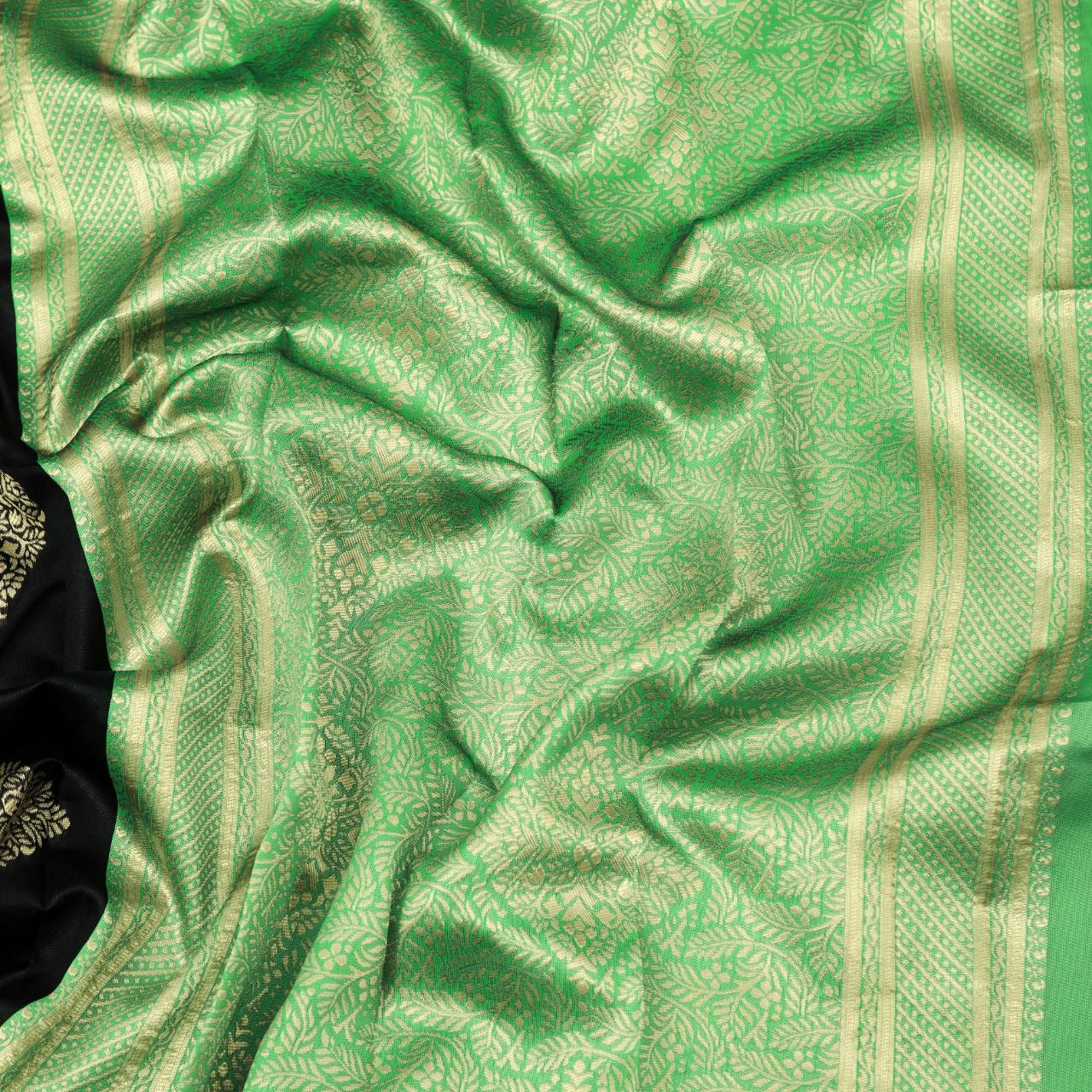 Shravya - Black Soft Silk Saree with Mint Green Zari Border and Gold Motifs