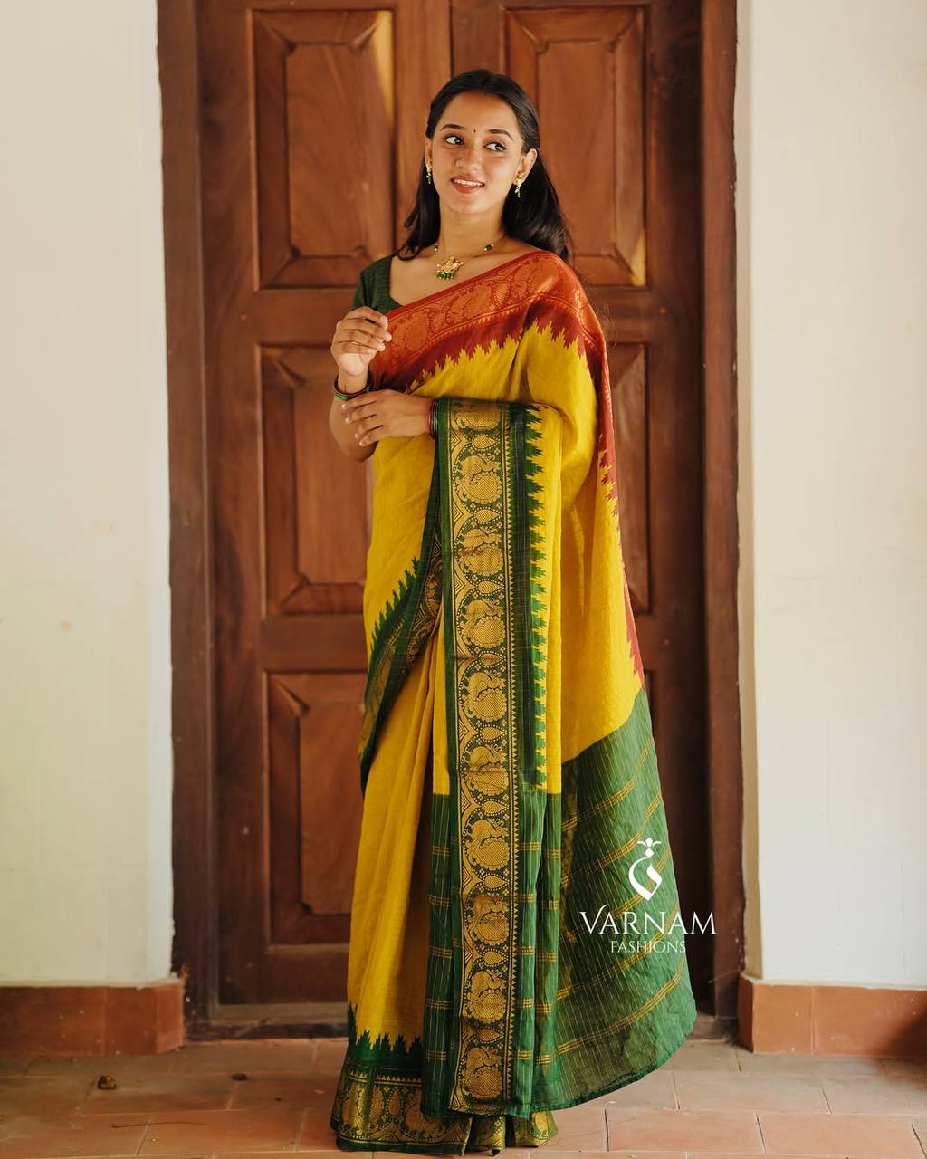 Elegant Mustard Yellow & Forest Green Kanchipuram Silk Saree with Traditional Peacock Zari Border